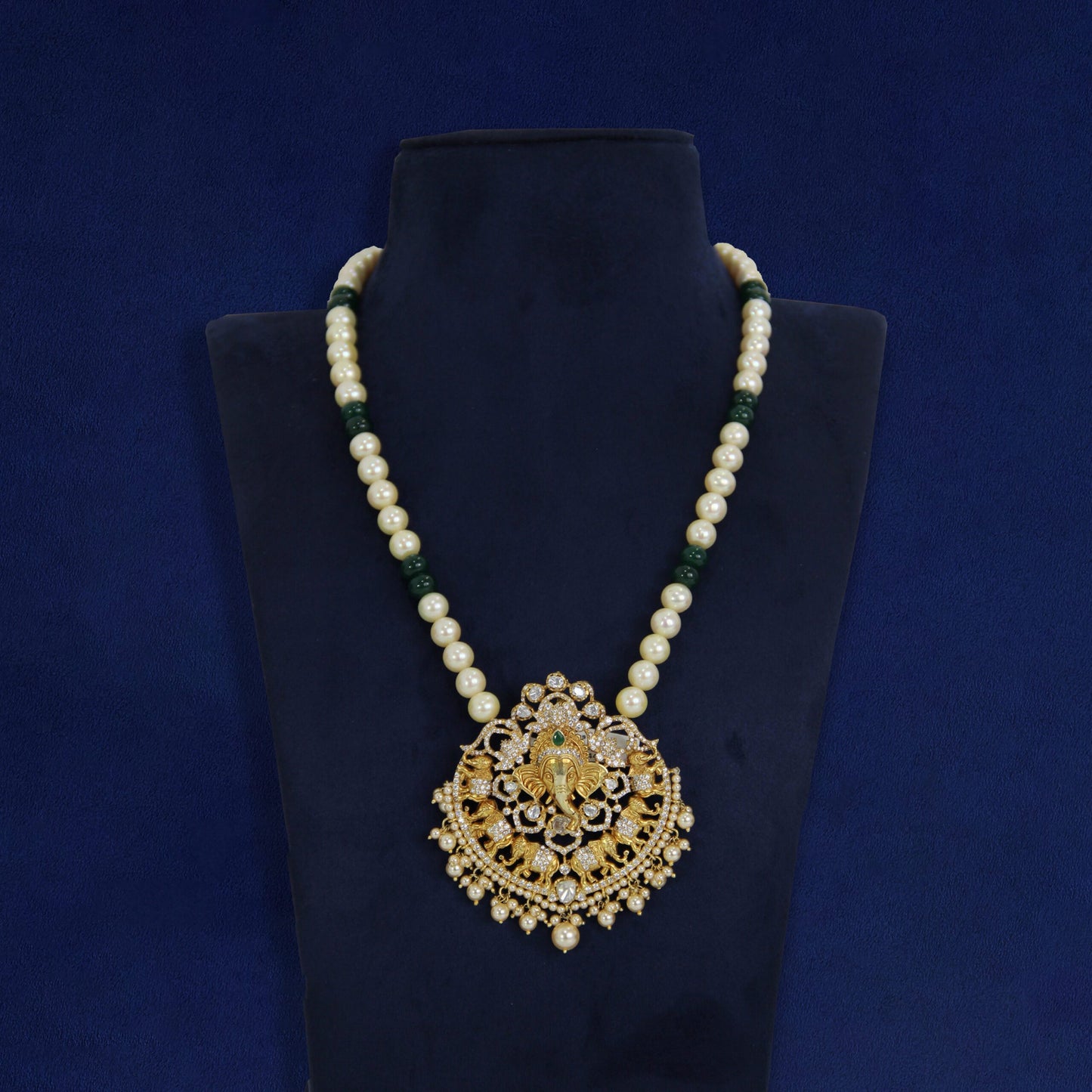 White pearl and green beads mala with a beautiful pendant.