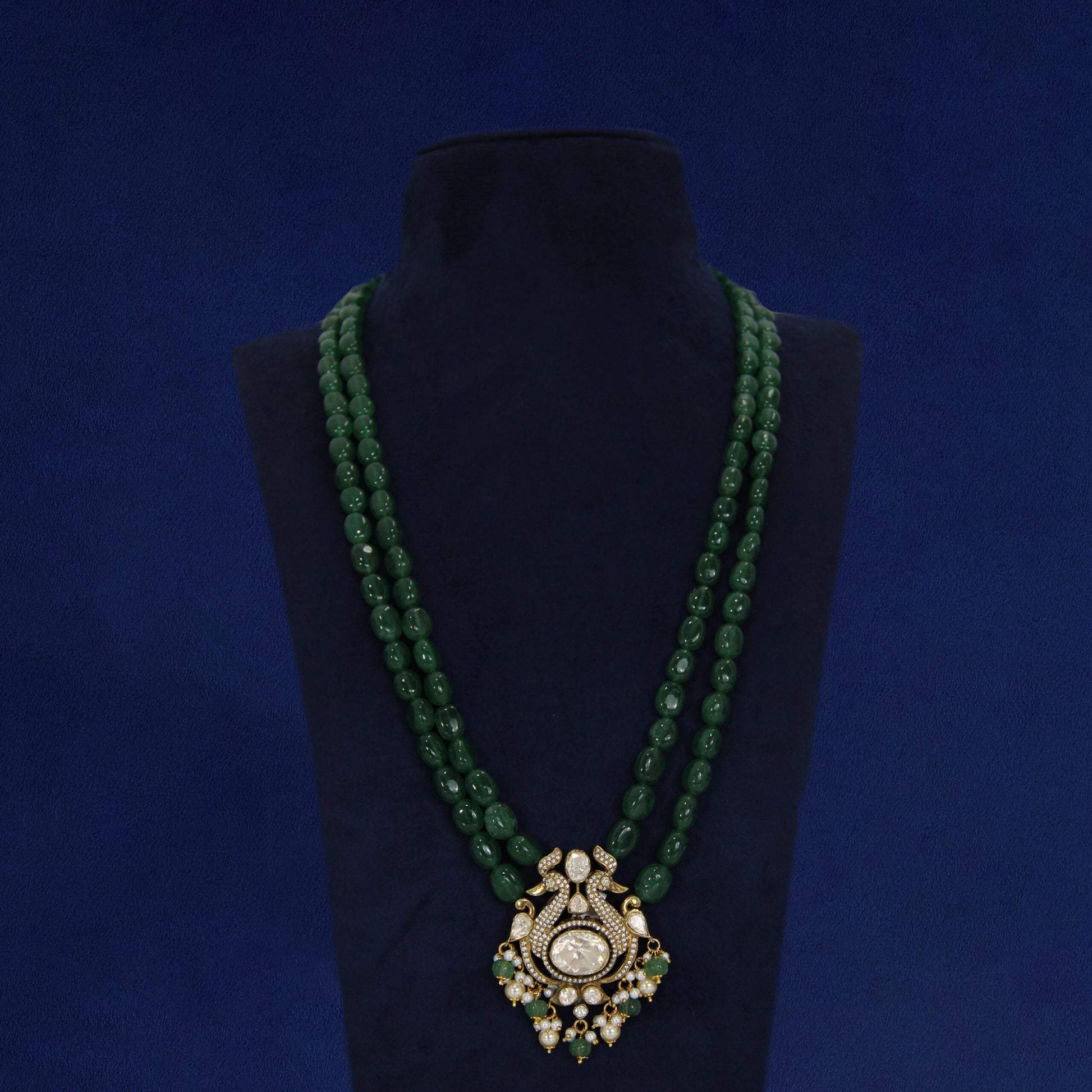 "Antique pearl maala with intricate kundan work for royal occasions"