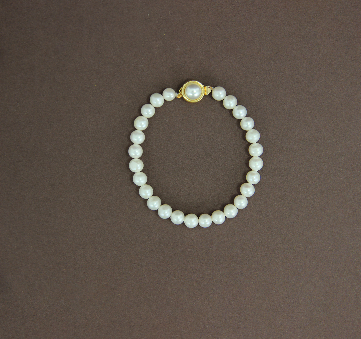 Luxe white pearl rakhi bracelet – classic rakhi gift