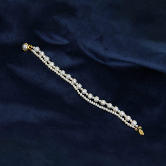 "Elegant pearl bracelet designed for weddings and bridal looks"