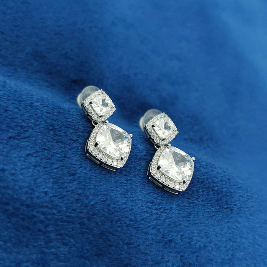 "Popular silver earrings for brides, crafted from sterling silver with intricate designs for a timeless bridal look."