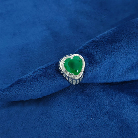 "Silver rings featuring ruby and emerald stones, set in high-quality sterling silver."